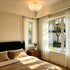 Orvieto Art Deco Scalloped Milk Glass Semi-Flush Mount Ceiling Light in Antique Brass