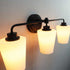 3-Light Black Bathroom Vanity Light Fixture with Milk Glass Shade